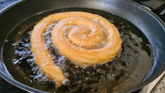 Churro im heissen Fett